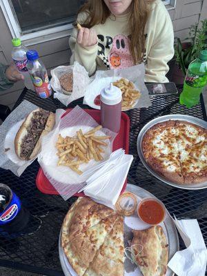 White Pizza, calzone, fries, steak bomb, roast beef sandwich.