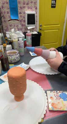 painting our chosen pottery