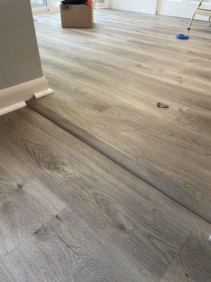 The ugly result - a slope instead of smooth continuous flooring