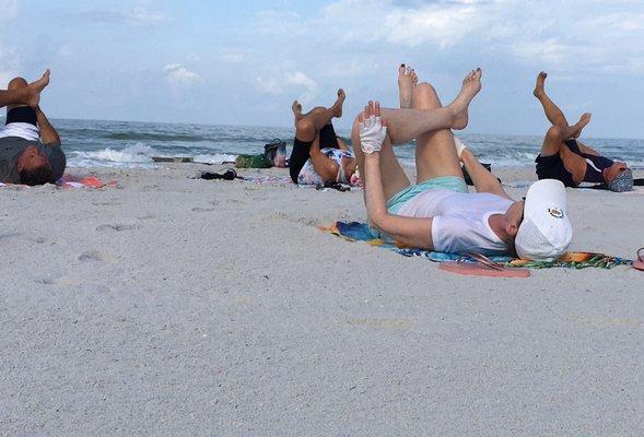 Hip openers on the beach feel decadent.  Join us for beach yoga sometime and see how fun it is in person.