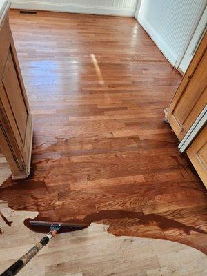 Refinishing an older floor to match a new installed hardwood floor