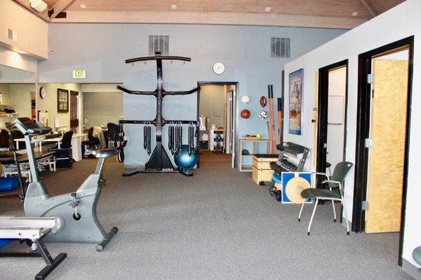 Open space gym facility, encouraging "movement based" treatments.