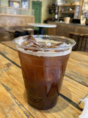 $4.36 iced Americano decaf. Coffee so I can sit to eat my bagel! 06/28/24