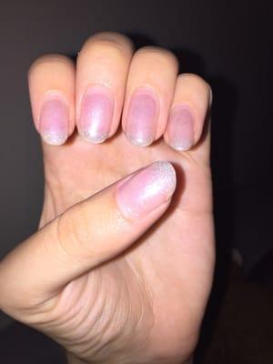 Terribly uneven oval shape acrylics on my natural nail. Ignore growth. On my natural nail, they didn't want to put tips on