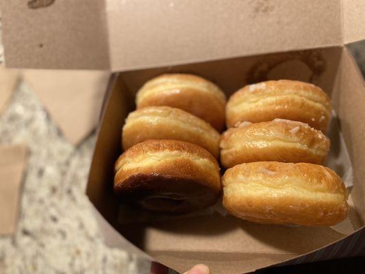 Half a dozen of donuts- glazed and a chocolate