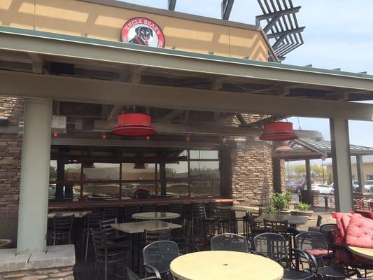 Custom Fire Engine Red Revolution High Output Misting Fans installed at Uncle Bears Restaurant in QC.