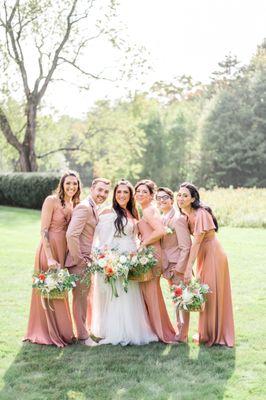 Fun cottage garden wedding with baskets as bouquets!