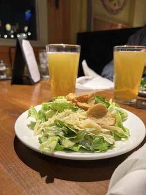 Split a Caesar salad for starters.