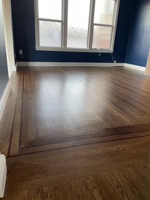 Dining room repaired and restored by Farrell after 30+ years under old carpet.