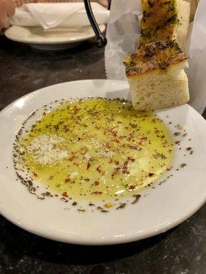 Fresh dipping Olive oil and focaccia bread