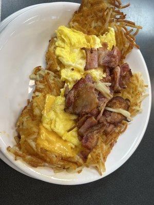 Hash browns with bacon and cheese.