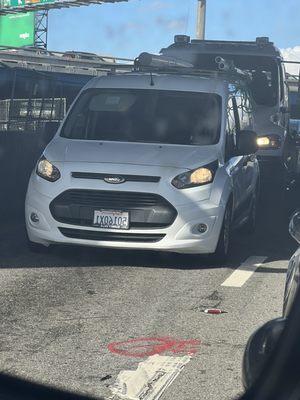 Female road rage driver with male passenger.