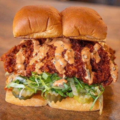 Bad Mutha Clucka (hot) - Nashville style fried chicken tenders, pickles, lettuce, secret sauce, served on Kings Hawaiian rolls