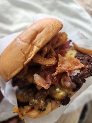 Double bacon cheeseburger with crispy onions