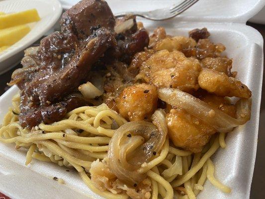 Combo plate with chicken & pork, over noodles