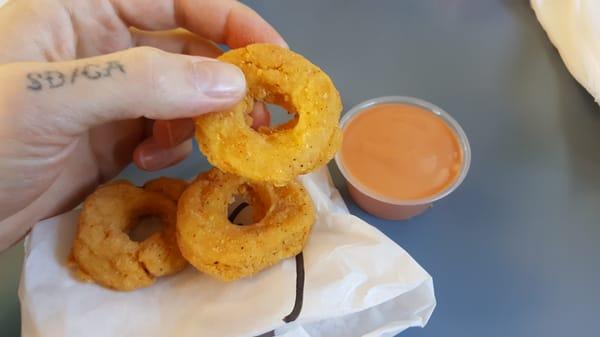 Chicken-O's. Not on the menu,  but available upon request.  A ring shaped white meat chicken nugget. Better than the competitors nuggets.