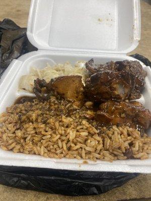 Brown stew chicken lunch special with rice and beans