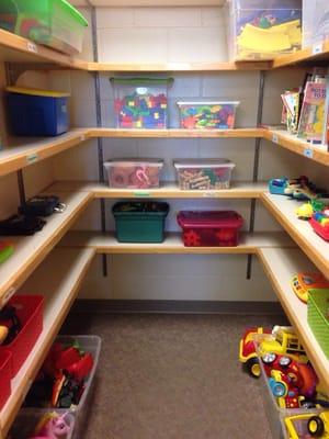 A closet full of toys for kids of a variety of ages!