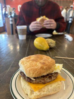 Biscuit Sandwich w/ sausage, fried egg, & cheddar cheese