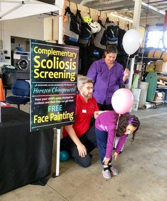 Dr. McDonald volunteering at the Corvallis Fire Department's open house. Having your child's spine is important for growing up healthy!