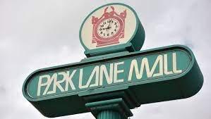 Beloved Ginsberg Clock incorporated into Park Lane Mall logo