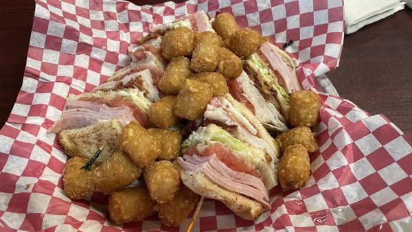 Ham, Turkey and bacon club. Fresh and delicious