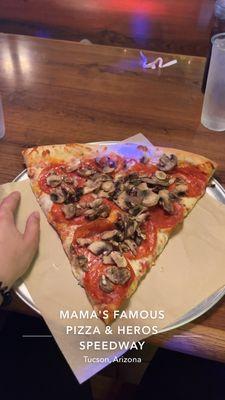 Pepperoni mushroom pizza slice for lunch