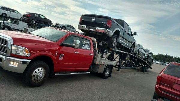 Electric city towing at work.