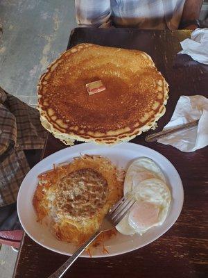 Hiker Breakfast included hashbrowns, 2 eggs, sausage patty,  and all you can eat pancakes that are bigger than your head! Delicious!