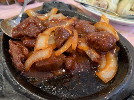 Sizzling beef and onions