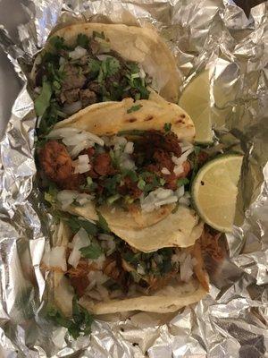 Carne asada, al pastor, and chicken taco (top to bottom).