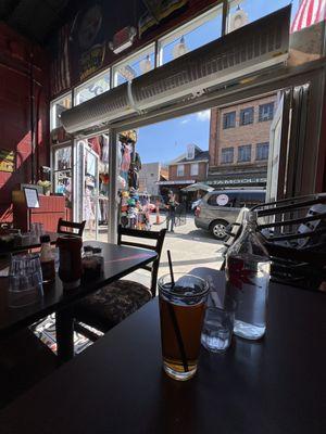 Outdoor seating and they open the windows on a nice day!