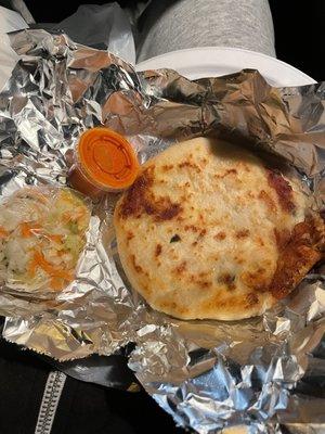 Pupusa, pickled vegetables, hot sauce