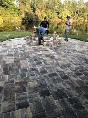 Finishing up our backyard pavement design and fire pit all in one day