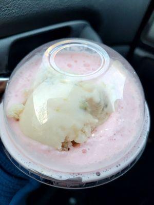 Badshadi Faloodi $7.99 in 12oz cup: rose water shake, basil seeds, faloodi noodles, and scoop of pistachio ice cream (top view)