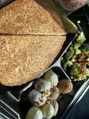 Chicken salad on toast with broccoli salad and grape salad