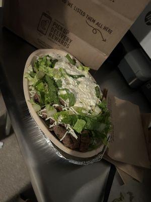 Rice bowl with chicken, black beans, cheese and lettuce (salsa and sour cream on the side).