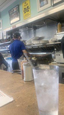 Old school breakfast counter with the flat top grill.