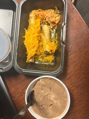 3 rolled tacos with cheese, () crusty refried beans.  ABSOLUTELY LIVID AND REVOLTED!