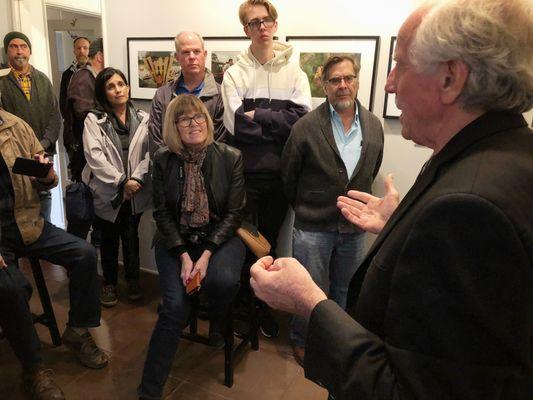 Don Bartletti speaks to gallery visitors