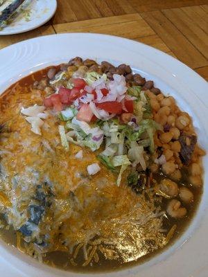 Chicken enchiladas (Christmas-style with red and green chili sauce)