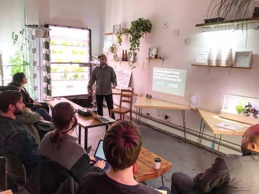 Djavid Amidi-Abraham, Lead Systems Designer at Agritecture Consulting, leading a class on "How Environmental Factors Affect Plants"