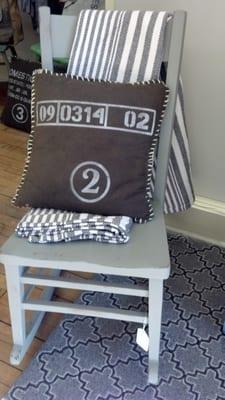 Repurposed throw pillow, cute throw and a chair painted in Annie Sloan Chalk Paint.