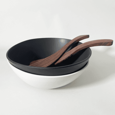 The perfect combo: stoneware bowls by Gharyan, and rustic wooden salad tossers by Peterman's Boards & Bowls.