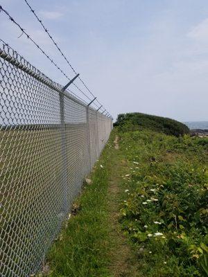 Path runs along perimeter of Camp Varnum