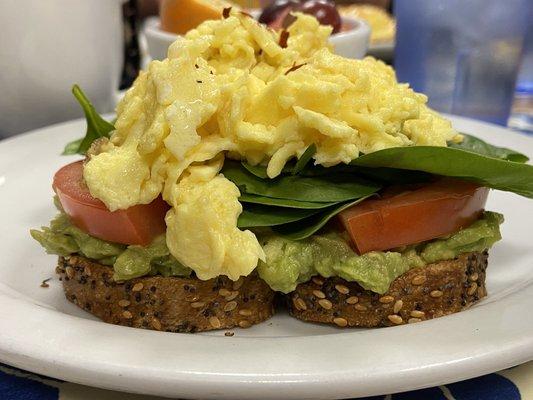 Everything toast, avocado, tomato, spinach, scrambled eggs