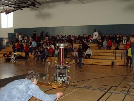 Man demonstrating science contraption