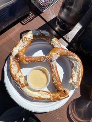 Pretzel and hot cheese sauce. And don't forget the spicy mustard!