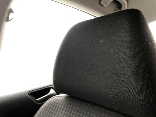 Passenger side head rest