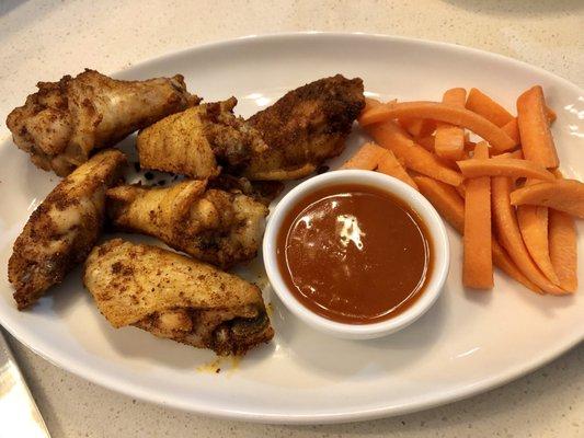 Baked wings with a nice hot sauce to accompany